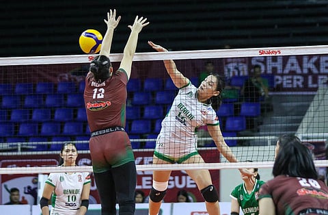 Saint Benilde’s Clydel Catarig penetrates the defense of UP during their SSL Collegiate Pre-season Championship classification round clash.