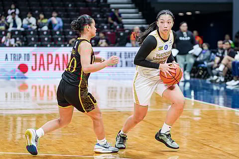 Camille Clarin carries the NU Lady Bulldogs to a 76-70 win over the UST Growling Tigresses to inch closer to a sweep of Season 87 UAAP women’s basketball tournament elimination round.