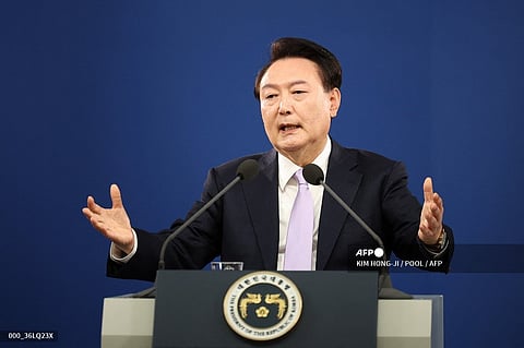 South Korean President Yoon Suk Yeol answers a reporter's question during a press conference at the Presidential Office in Seoul on 7 November. Major arms exporter South Korea is not ruling out providing weapons directly to Ukraine, Yoon said, signaling a possible shift in Seoul's stance on the issue.