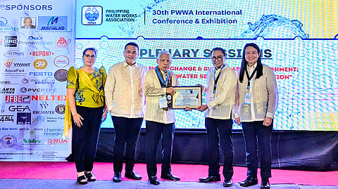 LOOK: Vivant Water CEO Atty. Jess Anthony Garcia (4th from left) is awarded a certificate of appreciation for his role as a plenary speaker at the recent water conference. Joining him in the photo (L-R) are PWWA Director Juliet Nacita, PWWA National Vice President Dr. Dickson San Juan, PWWA President Atty. Vicente Joyas, and PWWA Director Joel De Jesus. | Photo courtesy of Vivant water