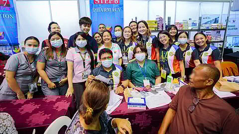 FIRST Lady Liza Araneta-Marcos checks in with the medical staff of the local government unit of General Santos City who tends to locals in need of medical assistance.
