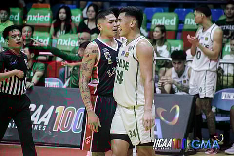 Allen Liwag (right) gets the last laugh as Saint Benilde downed Pao Javillonar and Letran, 83-78, on Friday in Season 100 NCAA men’s basketball tournament.