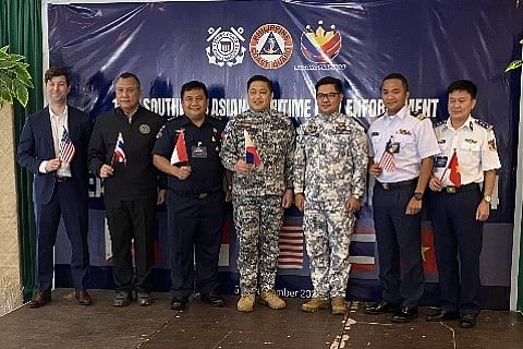 LOOK (L-R) U.S. Embassy Bureau of International Narcotics and Law Enforcement Affairs (INL) Deputy Director Luke Bruns, Thailand delegation head Captain Ktitkorn Kanjanawanich, Indonesia delegation head Commander Semuel Sandi Rundupadang, Philippine Coast Guard Captains Noriel Ramos and Jimmy Naisod, Malaysia delegation head Commander Mohd Hairil Bin Othman, and Vietnam delegation head Colonel Cao Vu Long. | Photo courtesy of USCG