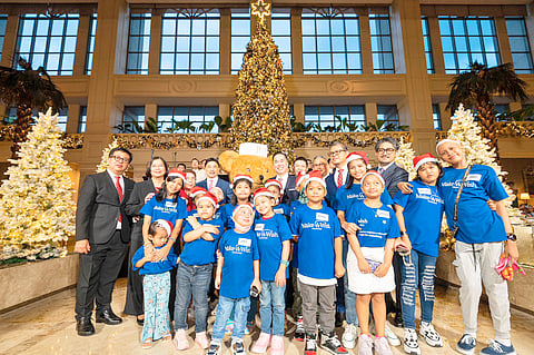 Make-A-Wish Foundation kids with The Peninsula managing director Kevin Tsang and the hotel’s executive committee and Pen Bear.