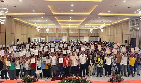 LOOK: SHFC President & CEO Federico Laxa leads the awarding of 68 transfer certificates of title and 148 certificates of award to member-beneficiaries of its Community Mortgage Program and High Density Housing Program, respectively. | Photo courtesy of SHFC