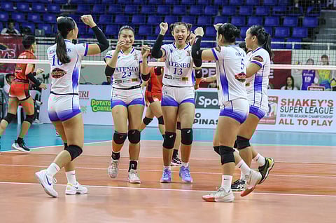 The Ateneo Blue Eagles celebrate after posting a straight-set win over the UE Lady Warriors in the 2024 Shakey’s Super League Collegiate Pre-season Championship game at the Rizal Memorial Coliseum.