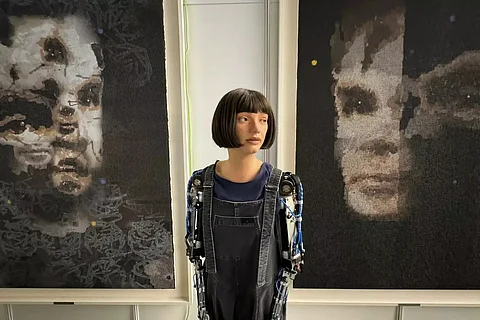 The 2.2 meter (7.5 feet) portrait ‘A.I. God’ by ‘Ai-Da,’ the world’s first ultra-realistic robot artist, smashed presale expectations of $180,000 when it went under the hammer at London auction house Sotheby’s Digital Art Sale.