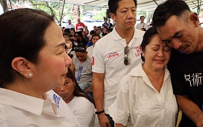 First Lady Liza Araneta-Marcos leads the distribution of assistance to bereaved families of the 61 who died during the onslaught of Severe Tropical Storm Kristine in Talisay, Batangas on Sunday (10 November 2024). Photo courtesy of DSWD