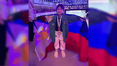 ALEIA Aielle Aguilar beams with pride after emerging as a three-time jiu-jitsu world champion in the 2024 World Festival Jiu-Jitsu Championship in United Arab Emirates over the weekend.