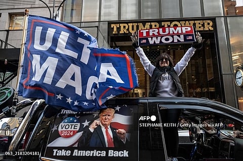 LOOK: NEW YORK, NEW YORK - 9 NOVEMBER: People participate in a car caravan in support of U.S. President-elect Donald Trump on 9 November 2024 in New York City. Despite the city historically leaning Democratic, the area saw one of the biggest increases in Trump support in the country. | Photo courtesy of1 Stephanie Keith/Getty Images/AFP STEPHANIE KEITH / GETTY IMAGES NORTH AMERICA / Getty Images via AFP