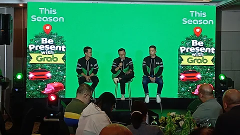 Grab Philippines country head Ronald Roda (center), together with director for Mobility EJ dela Vega (left) and director for Deliveries Greg Camacho, shares the strategy of the leading superapp in offering a better experience for app users amid the Christmas holiday demand growth.
