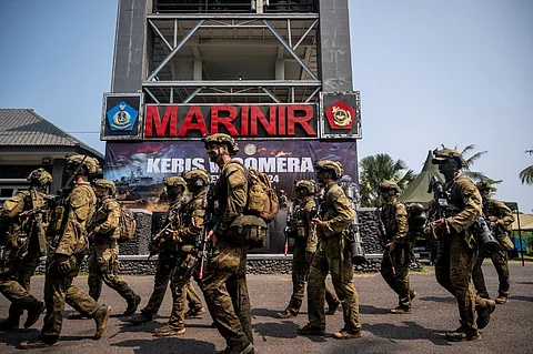 Indonesian marines and Australian Defence Force (ADF) take part in a joint military drills, named Keris Woomera, at Banongan beach in Situbondo on November 13, 2024. More than 2,000 Indonesian and Australian troops held joint military drills, after the allies signed a new defence agreement pledging closer cooperation to counter security threats in the Asia-Pacific region.