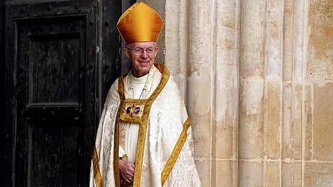 (FILES) Archbishop of Canterbury Justin Welby smiles at Westminster Abbey in central London on 6 May 2023, ahead of the coronations of Britain's King Charles III and Britain's Camilla, Queen Consort. The leader of the world's Anglican communion, Justin Welby, faced growing pressure on 11 November 2024, to resign after a damning report which concluded the Church of England had covered up a serial abuse case.