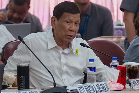 Former President Rodrigo Duterte attends the Quad Committee hearings on the extrajudicial killings (EJKs) during his administration's drug war