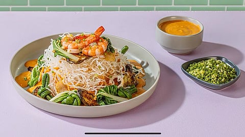 Crispy Pancit with Mixed Seafood Kare-Kare.