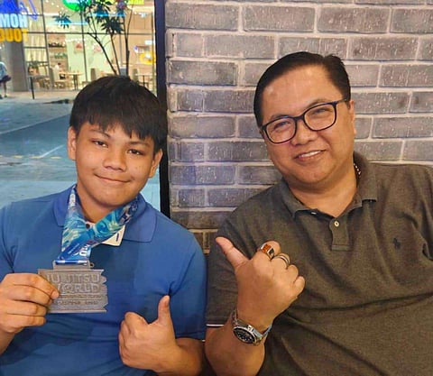 Jose Antonio Goitia congratulates Zeus Babanto for bringinh home a silver medal from the World Youth Jiu-Jitsu Championship in Greece recently.