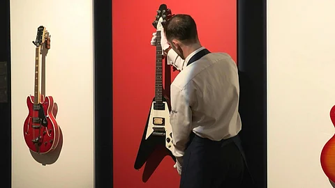 FILE PHOTO: Oasis 'Supersonic' guitar sells for $172,000
Two guitars featured on the cover of Oasis's 1994 debut single 'Supersonic' fetch above estimate prices at an auction, weeks after the British band announced a 2024 reunion tour, ending an infamous 15-year feud. An Epiphone Les Paul Standard guitar fetched £132,000 ($172,000), well above its £80,000 estimate, while an Epiphone EA-250, circa 1972-4 -- sold for £48,000. The online sale also saw guitars played by Prince, Eddie van Halen, an Abbey Road Studios piano, and Marianne Faithfull's designer jackets go under the hammer in Sotheby's first popular culture auction. Bidding opened from 29 August and closed on 12 September, following a four day exhibition of the items in London.