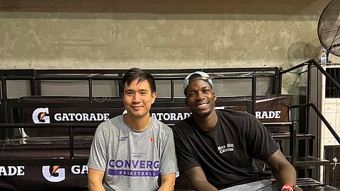 Converge assistant coach Charles Tiu (left) rolls out the red carpet for Cheick Diallo who will serve as their reinforcement in the PBA Governors’ Cup starting 27 November.