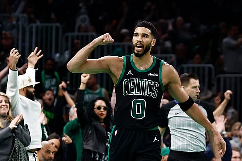 Jayson Tatum flexes his muscle after leading the Boston Celtics to a 120-117 victory over erstwhile unbeaten Cleveland Cavaliers in the NBA Cup.