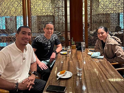 LA Tenorio (left) formally accepts the challenge as Gilas Pilipinas Youth mentor from SBP executive director Erika Dy (right) and SMC sports director Alfrancis Chua.