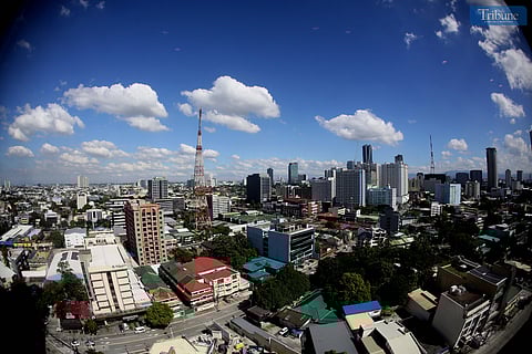 The Quezon City skyline glistens under clear skies on Wednesday, 20 November 2024, as PAGASA declares the arrival of the Northeast Monsoon (Amihan). With its cool and crisp air, Filipinos can look forward to cooler mornings and hopefully-refreshing weather in the months ahead.