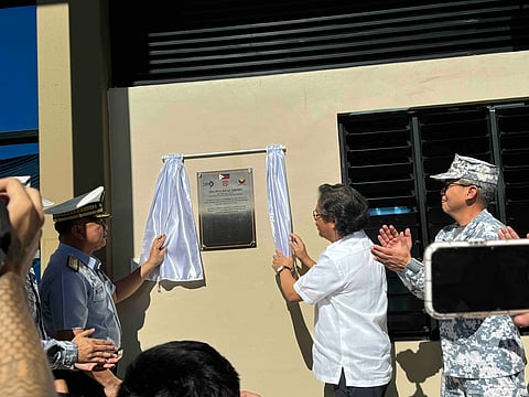 Philippine Coast Guard commandant Admiral Gil Gavan (left) and Philippine Ports Authority general manager Atty. Jay Santiago (center) unveil the marker of the PPA-PCG K9 Academy in Mabalacat, Pampanga on Wednesday.
