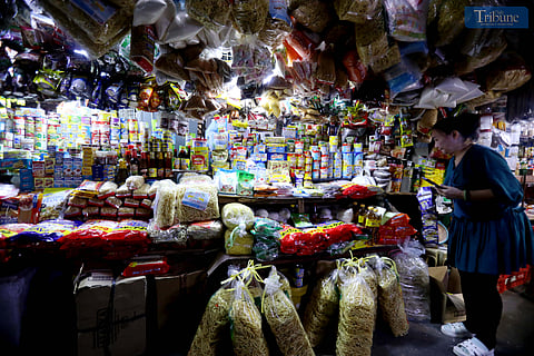 (November 22, 2024)………Personnel tends to their customers at a mini-grocery selling mostly Noche Buena items at Commonwealth Market in Quezon City on Friday, November 22, 2024,, The Department of Trade and Industry (DTI) has released a price guide for common Noche Buena items that will be effective until December 31, 2024. The guide aims to ensure access to reasonably priced products through Media Noche. Photo: Analy Labor…….Photo/Analy Labor