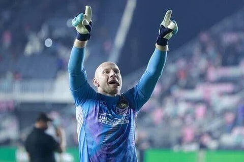 Goalkeeper Brad Guzan of Atlanta United celebrates after his team defeated Inter Miami in the first round of the MLS playoffs.