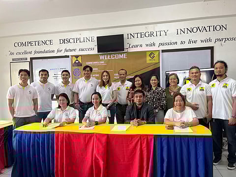 ABOITIZ Construction senior assistant vice president for people and corporate shared services Raizza Manuel (left, seated) with senior assistant vice president for business transformation Karmine Andrea Ching (2nd from left) pose with METACCI training manager Quincy Ladera (2nd from right) and METACCI director Richelle Figueroa (right, seated) after the signing of the partnership agreement.