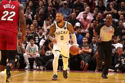 Damian Lillard picks up the cudgels, helping the Milwaukee Bucks book a 106-103 win over the Miami Heat in the NBA Cup on Tuesday.