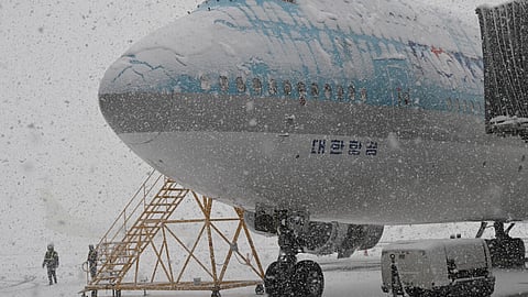 The snowfall caused flight cancellations and delays