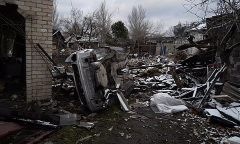 This photograph shows a destroyed car and rubble from a shelling in Pokrovsk, Donetsk region on November 24, 2024.