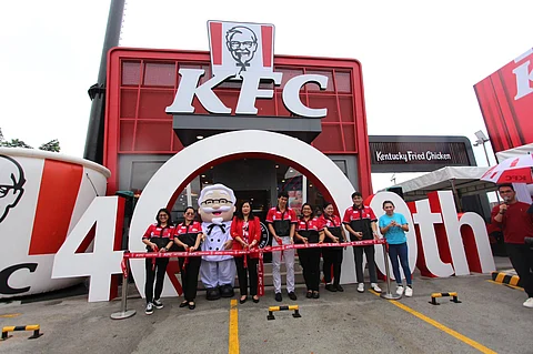Officials of KFC Philippines unveil its 400th store and 100th branch that has drive-thru service on Friday, situated on Highway 2000, Taytay, Rizal.
