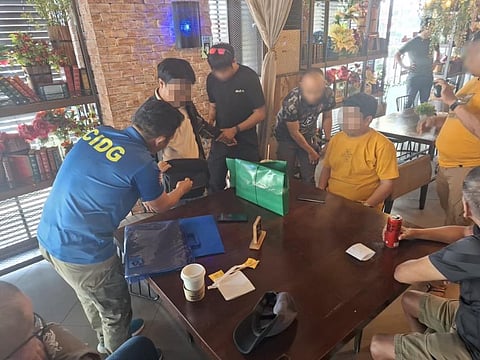 Radio commentator and his cohort during an entrapment operation in Cebu City for alleged extortion activities. (Photo from the PNP CIDG)