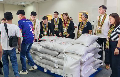 Japanese Embassy officials at the turnover of the rice donation to families affected by calamities in Leyte.