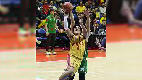 Clint Escamis and the Mapua Cardinals run away with an 84-73 Game 1 victory over Saint Benilde in their Season 100 NCAA basketball best-of-three finals series Sunday at the Smart Araneta Coliseum.