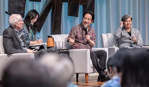This handout photo taken and released by Taiwan's Presidential Office on 1 December, 2024 shows Taiwanese President Lai Ching-te (2nd R) speaking, flanked by Suzanne Vares-Lum (R), president of the East-West Center at the University of Hawaii, during his visit to the East-West Center in Honolulu, Hawaii. Taiwanese President Lai Ching-te said in the United States on November 30 that we have to "fight together to prevent war", as he kicked off a week-long tour of the Pacific that has sparked fiery rhetoric from Beijing.