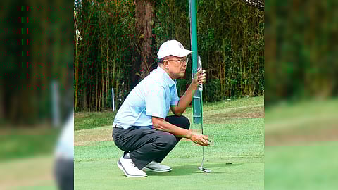 RYAN Abdon of Manila Southwoods reads the green during the second round of the 74th Januarius Fil-Am Championship at the Baguio Country Club in Baguio City on Sunday.