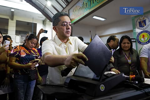 Comelec Chairman George Erwin Garcia kicks off the nationwide Automated Counting Machine (ACM) roadshow at Manila High School in Intramuros, Manila, on Monday, 2 December. The new ACMs are set to debut in the 2025 midterm elections and subsequent polls.