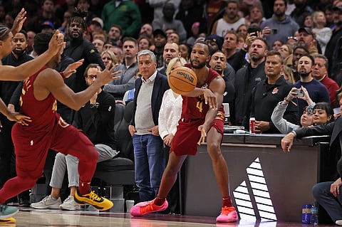 CLEVELAND, OH - 1 DECEMBER: Evan Mobley #4 of the Cleveland Cavaliers passes the ball during the game against the Boston Celtics at Rocket Mortgage FieldHouse in Cleveland, Ohio.