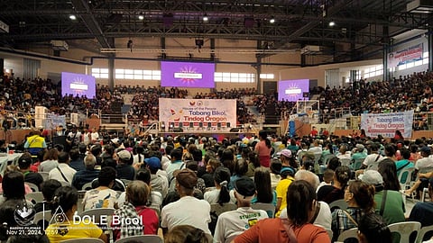 DOLE distributes P210-M TUPAD aid to typhoon victims in CamSur