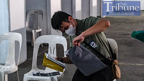 Jobseekers line up for an initial interview during a job fair organized by the Manila LGU at Park 'N Ride, Lawton, Manila, on Tuesday, 9 July 2024. The unemployment rate in the Philippines dropped to 4.1% in May 2024, down from 4.3% the previous year, with 2.11 million Filipinos jobless. Despite this improvement, there was an increase of 65,000 unemployed individuals from April to May 2024. The number of employed persons rose by 605,000 year-over-year to 48.87 million, boosting the employment rate to 95.9%. Underemployment also saw a significant decline, with the rate falling from 11.7% to 9.9%, indicating better employment conditions for workers.