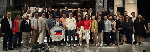 POC president Abraham ‘Bambol’ Tolentino (middle) smiles after hosting a thanksgiving party for national sports association leaders last Thursday at Hotel Okura in Pasay City.