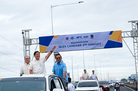 President Ferdinand R. Marcos Jr. leads the inauguration of the NLEX Candaba 3rd Viaduct on 10 December 2024 in Apalit, Pampanga. An essential part of the NLEX network, the 5-kilometer-long Viaduct is a vital link between Metro Manila, and Central and Northern Luzon. With the President are Department of Public Works and Highways Secretary Manuel Bonoan (right), and Manuel Pangilinan, chairman of Metro Pacific Investments Corporation and chairman and CEO of Manila North Tollways Corp.