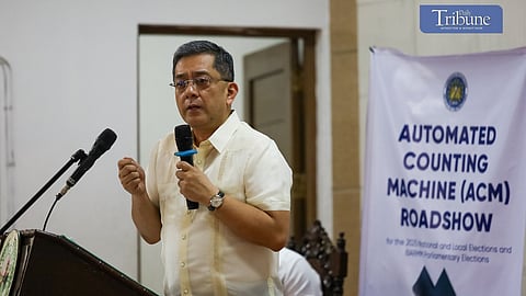 Comelec Chairman George Erwin Garcia kicks off the nationwide Automated Counting Machine (ACM) roadshow at Manila High School in Intramuros, Manila, on Monday, 2 December. The new ACMs are set to debut in the 2025 midterm elections and subsequent polls.