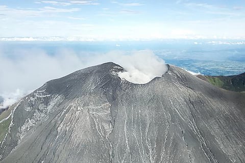 This handout photo taken and released by the Philippine Air Force Thursday shows a view of the crater on Kanlaon volcano in Negros Occidental province, central Philippines, taken during an aerial inspection following an eruption that occurred on 9 December.