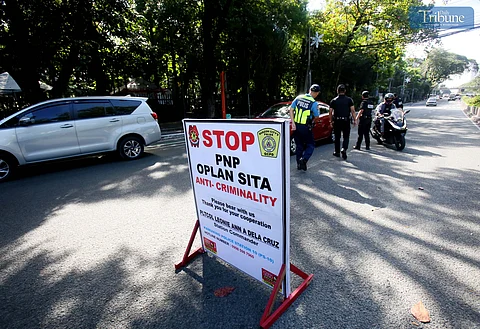 On 13 December 2024, Quezon City Police District (QCPD) Station 10 conducts 'Oplan Sita' along East Avenue in Quezon City to increase police visibility, avoid criminal activity, and ensure the safety of the people during their Christmas celebrations.