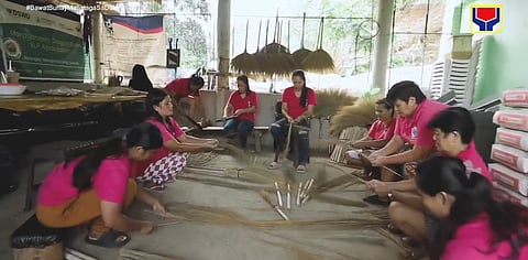 Members of the Maragondon Dragon Grass Association make walis tambo from tiger grass in Real, Quezon.
