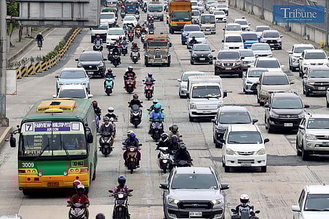 (December 17, 2024) On Tuesday, December 17, 2024, motorcycle taxis were seen plying Commonwealth Avenue in Quezon City. The Land Transportation Franchising and Regulatory Board (LTFRB) has issued a show cause order (SCO) to two of the three ride-hailing companies operating in the national capital for allegedly exceeding the government's limit on the number of motorcycle taxi riders. Photo/Analy Labor