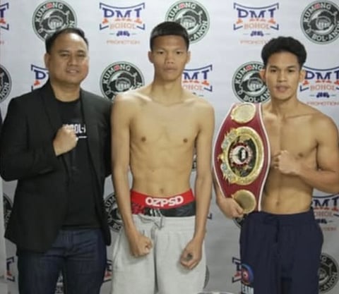 Regie Suganob (center) and Reymart Tagacanao are two top talents of Floriezyl Echavez Podot’s PMI Boxing Promotions.